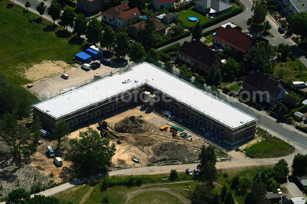Aerial image Wildau - Construction site for the new residential and commercial building on Freiheitstrasse in Wildau in the state Brandenburg, Germany