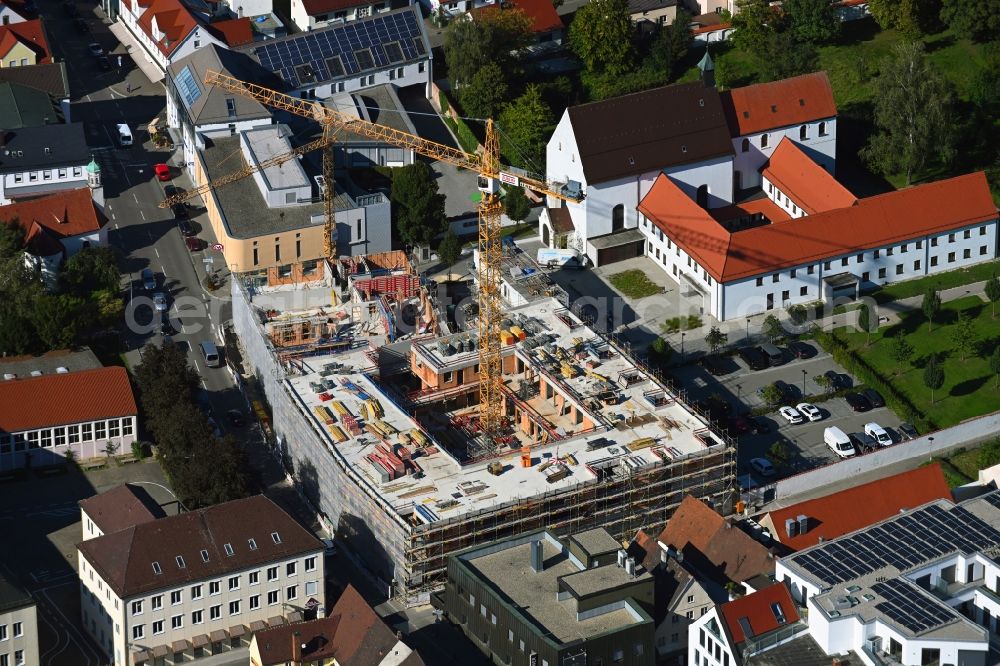 Dillingen an der Donau from the bird's eye view: Construction site for the new residential and commercial building on Kapuzinerstrasse corner Waisenhaisgaesschen in Dillingen an der Donau in the state Bavaria, Germany