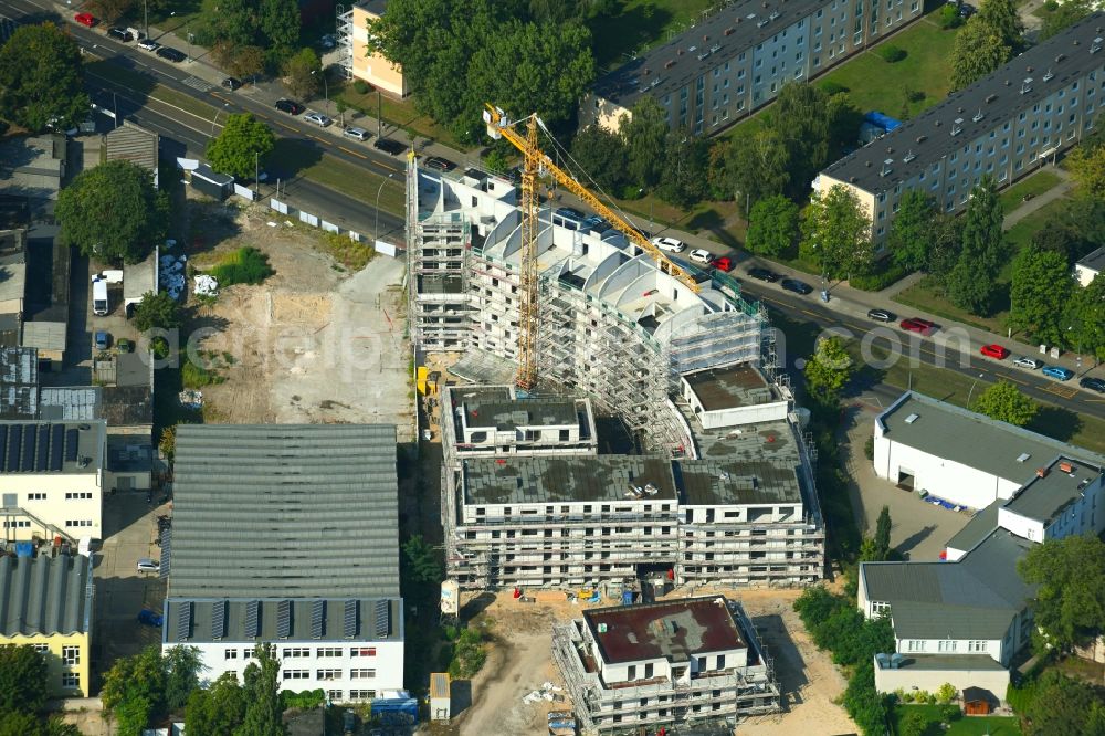 Berlin from above - Construction site for the new residential and commercial building on the Mahlsdorfer Strasse - Hirtenstrasse in the district Koepenick in Berlin, Germany