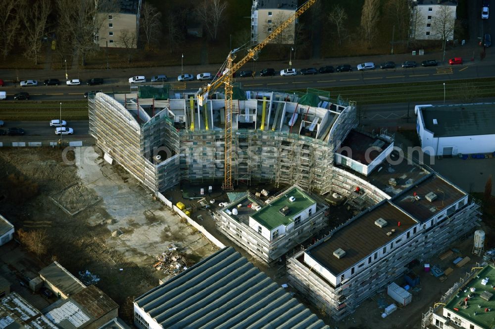 Aerial photograph Berlin - Construction site for the new residential and commercial building on the Mahlsdorfer Strasse - Hirtenstrasse in the district Koepenick in Berlin, Germany