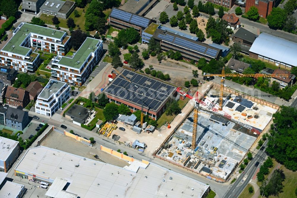 Aerial photograph Lehrte - Construction site for the new residential and commercial building Parkstrasse - Manskestrasse - Schlesische Strasse in Lehrte in the state Lower Saxony, Germany