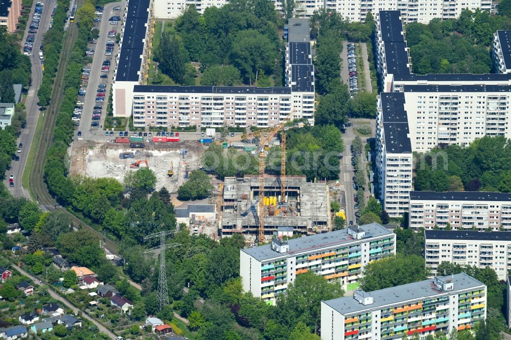 Berlin from the bird's eye view: Construction site for the new residential and commercial building on Muehlengrund between Ruedickenstrasse, Rotkonp and Matenzeile in the district Hohenschoenhausen in Berlin, Germany
