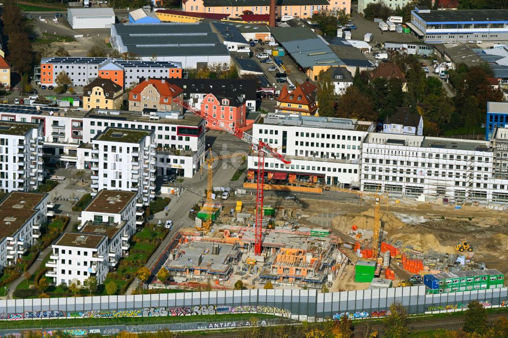 Regensburg from above - Construction site for the construction of a multi-family residential and commercial building on Edith-Stein-Strasse - Zuckerfabrikstrasse - Straubinger Strasse in the district of Ostenviertel in Regensburg in the state Bavaria, Germany