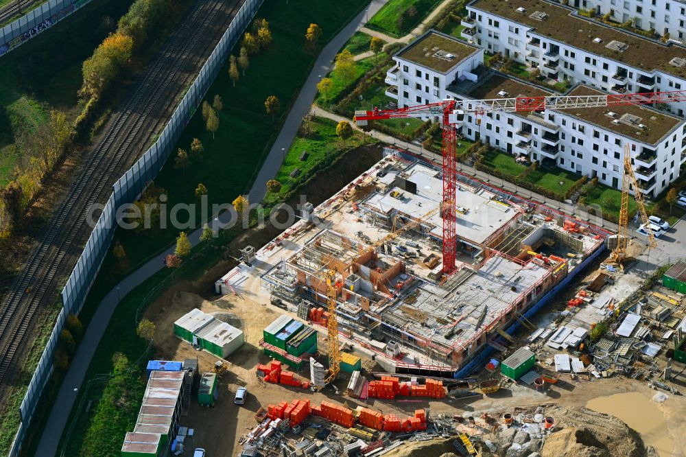 Regensburg from above - Construction site for the construction of a multi-family residential and commercial building on Edith-Stein-Strasse - Zuckerfabrikstrasse - Straubinger Strasse in the district of Ostenviertel in Regensburg in the state Bavaria, Germany