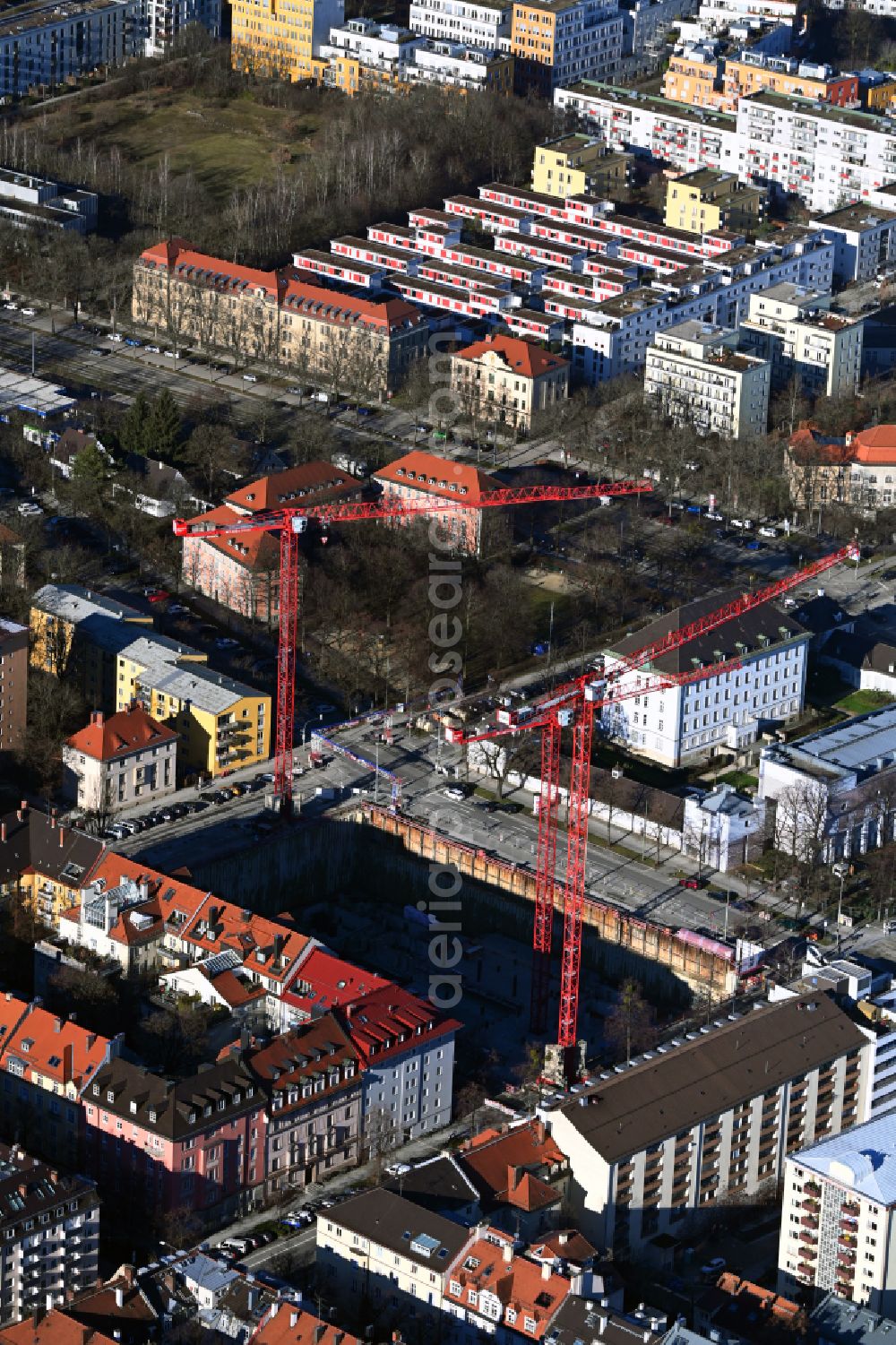 München from the bird's eye view: Construction site for the new residential and commercial building Schleissheimer Strasse - Elisabethstrasse - Winzerstrasse in the district Schwabing-West in Munich in the state Bavaria, Germany