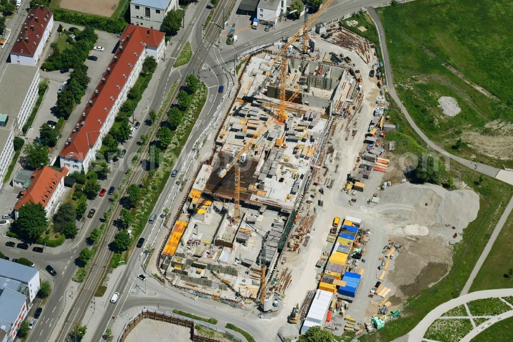 Augsburg from the bird's eye view: Construction site for the new residential and commercial building of Wohnbaugruppe Augsburg on Landvogtstrasse in the district Kriegshaber in Augsburg in the state Bavaria, Germany