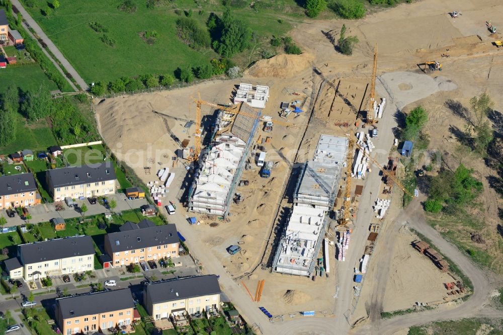 Aerial image Berlin - Construction site to build a new residential complex on Wegedornstrasse in the Altglienicke part of the district of Treptow-Koepenick in Berlin in Germany. The project consists of single family homes and semi-detached houses. It is being run by NCC AB