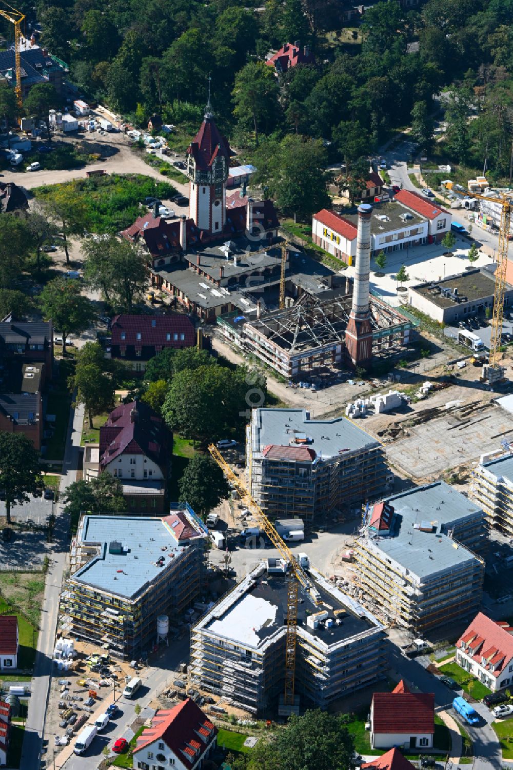 Aerial photograph Beelitz - Residential area construction site of a mixed development with multi-family houses and single-family houses- New building at the Quartier Beelitz-Heilstaetten in Beelitz in the state Brandenburg, Germany