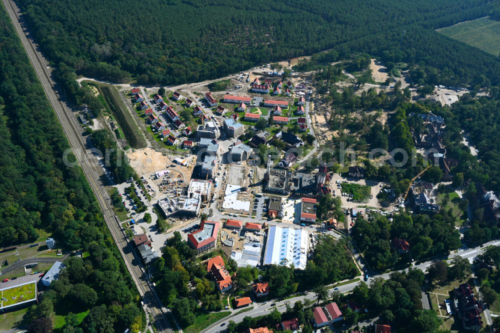 Beelitz from the bird's eye view: Residential area construction site of a mixed development with multi-family houses and single-family houses- New building at the Quartier Beelitz-Heilstaetten in Beelitz in the state Brandenburg, Germany
