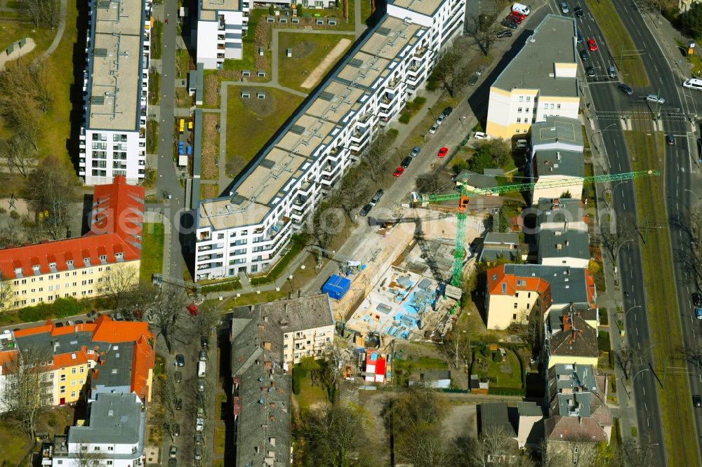 Berlin from above - Construction site for the multi-family residential building of the project KARL IM GLUeCK on Hoenower Strasse in the district Karlshorst in Berlin, Germany