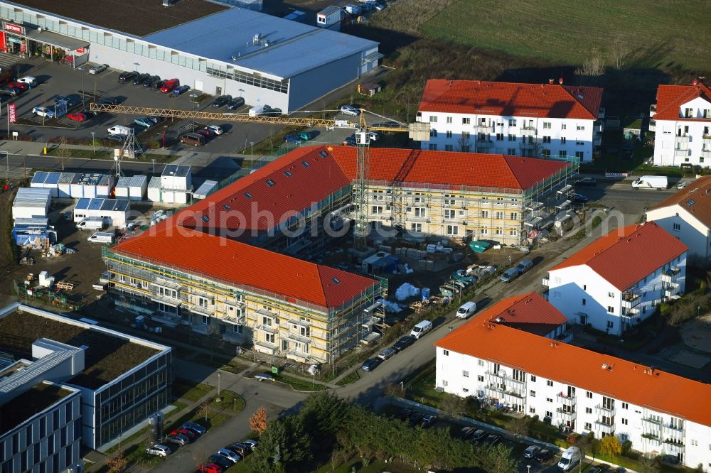 Potsdam from the bird's eye view: Construction site for the multi-family residential building of Bayerische Staedte- and Wohnungsbau GmbH & Co. KG Am Zachelsberg / In der Feldmark in the district Golm in Potsdam in the state Brandenburg, Germany