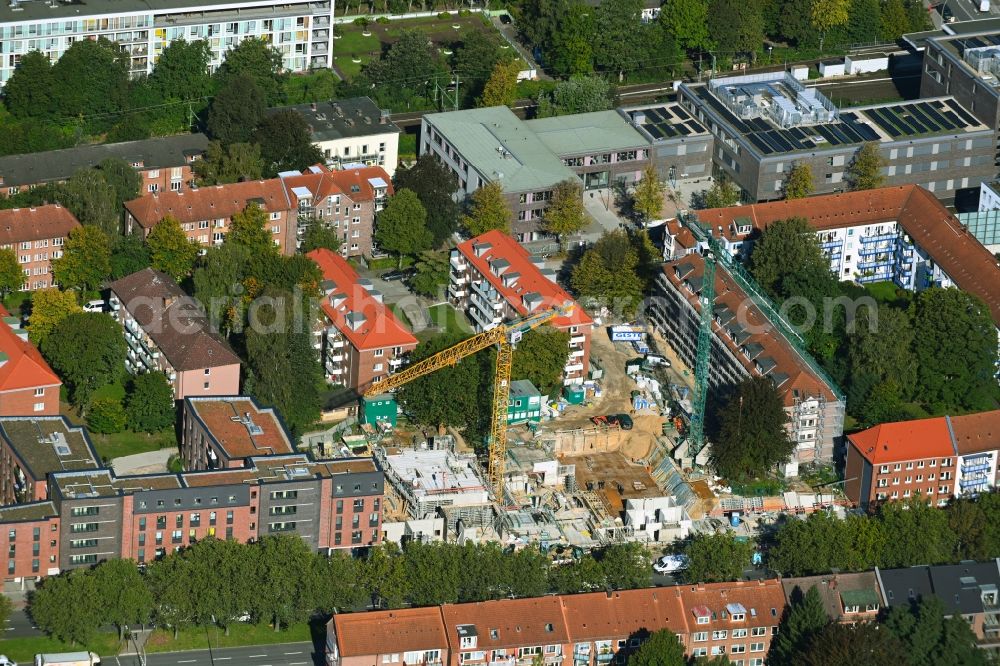 Hamburg from the bird's eye view: Construction site for the multi-family residential building of the Borgfelder Quartier on Buergerweide in the district Hohenfelde in Hamburg, Germany