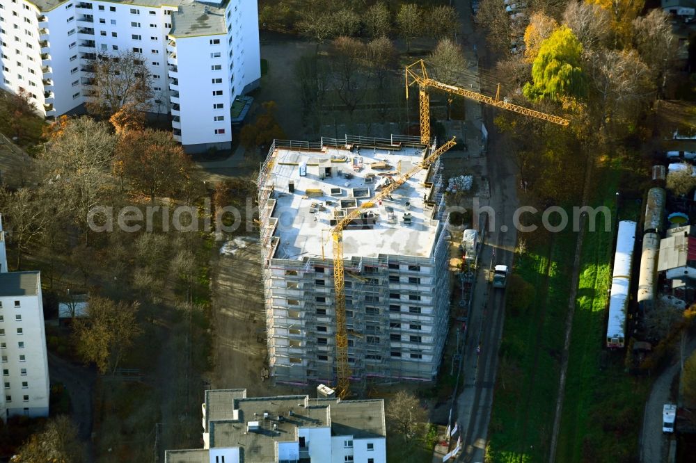 Aerial image Berlin - Construction site for the new construction of an apartment building on Bruchstueckegraben in the Maerkisches Viertel district in Berlin, Germany