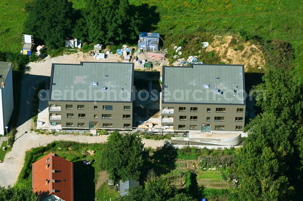 Aerial photograph Dahlwitz-Hoppegarten - Construction site for the multi-family residential building on street Alte Berliner Strasse in Dahlwitz-Hoppegarten in the state Brandenburg, Germany