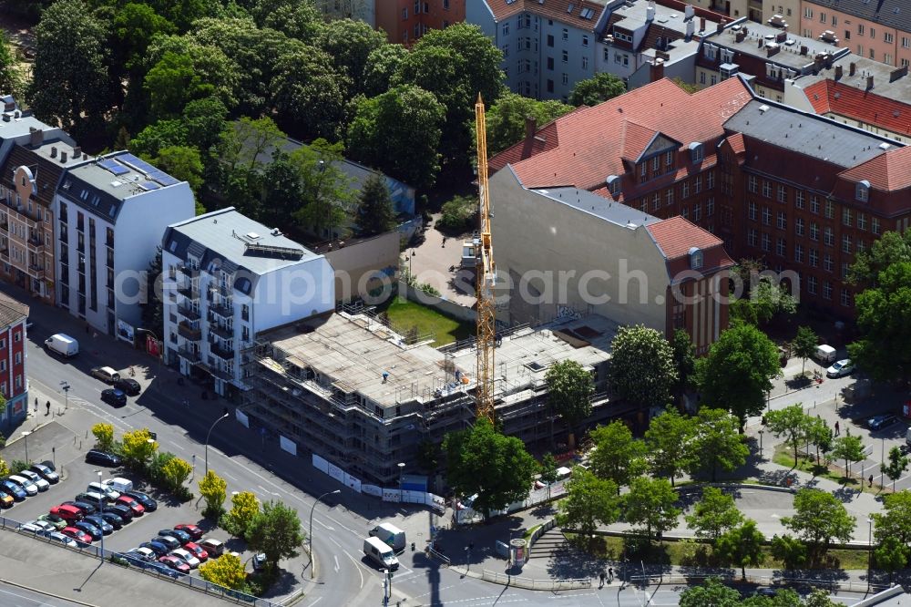 Aerial photograph Berlin - Construction site for the construction of an apartment building on Einbecker Strasse - Woennichstrasse in the Rummelsburg district in Berlin, Germany