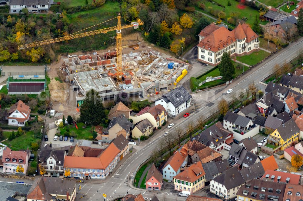 Ettenheim from the bird's eye view: Construction site for the multi-family residential building on Frauenweg in Ettenheim in the state Baden-Wuerttemberg, Germany