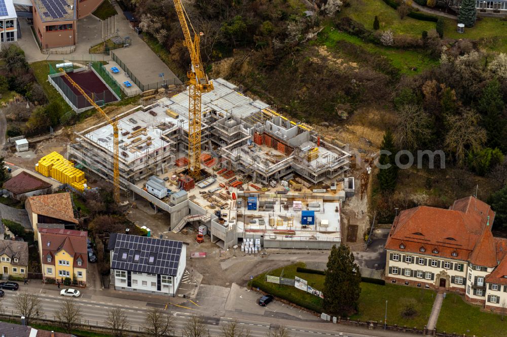 Ettenheim from the bird's eye view: Construction site for the multi-family residential building on Frauenweg in Ettenheim in the state Baden-Wuerttemberg, Germany