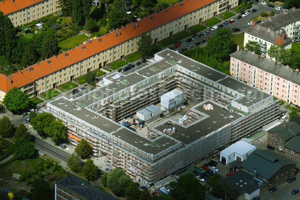 Berlin from the bird's eye view: Construction site for the multi-family residential building Gustav-Adolf-Strasse - Schmohlstrasse - Gaeblerstrasse in the district Weissensee in Berlin, Germany