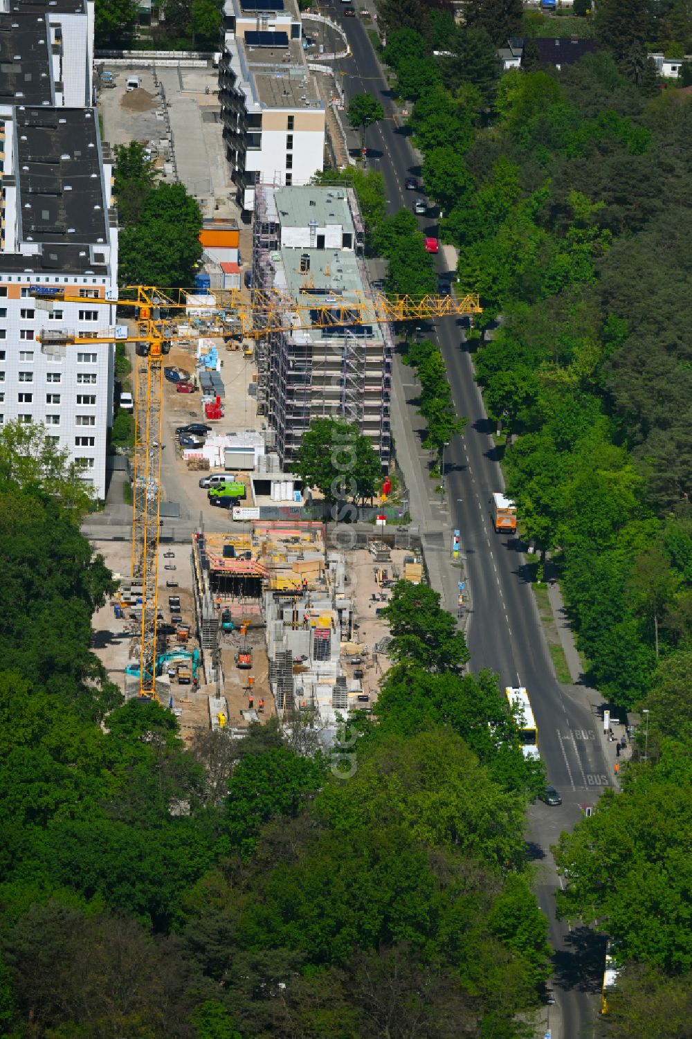 Berlin from above - Construction site for the multi-family residential building in wood hybrid construction on street Pablo-Neruda-Strasse - Salvador-Allende- Strasse in the district Koepenick in Berlin, Germany
