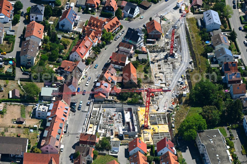 Kornwestheim from the bird's eye view: Construction site for the multi-family residential building on street Muehlhaeuser Strasse in Kornwestheim in the state Baden-Wuerttemberg, Germany