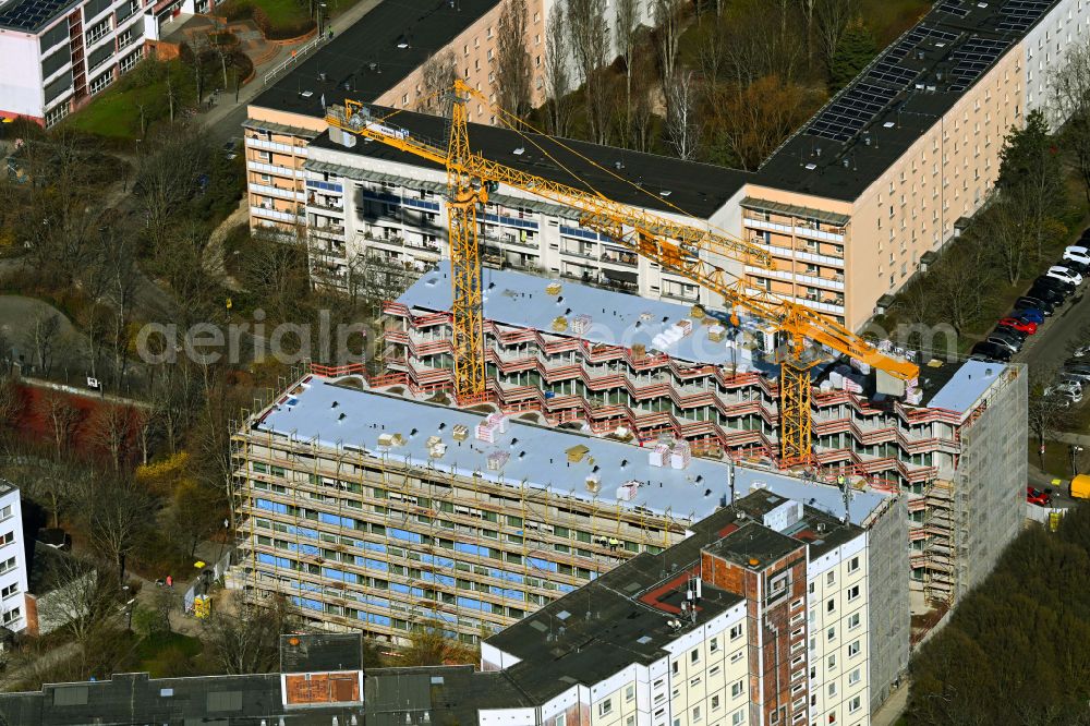 Berlin from the bird's eye view: Construction site for the multi-family residential building Lion-Feuchtwanger-Strasse in the district Hellersdorf in Berlin, Germany