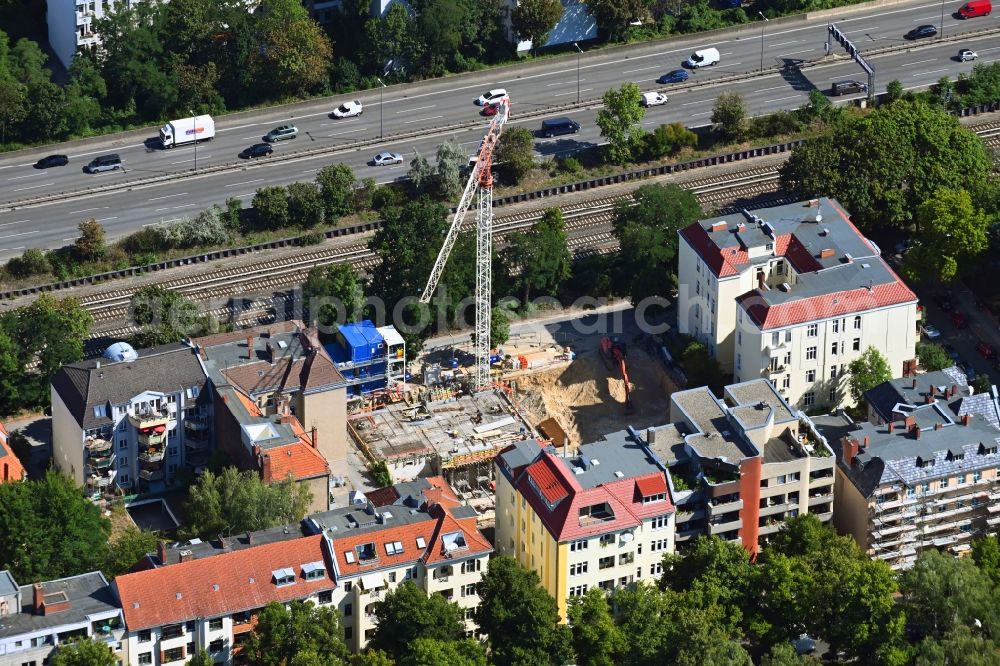Berlin from the bird's eye view: Construction site for the multi-family residential building Maison VIKTORIA on Varziner Strasse - Stubenrauchstrasse in the district Friedenau in Berlin, Germany