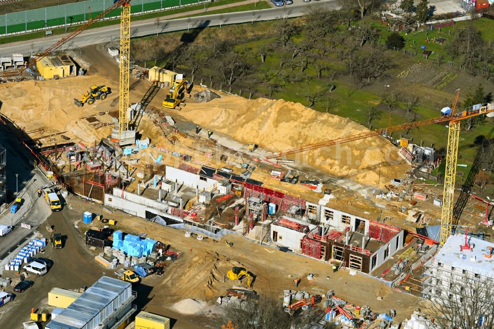 Michendorf from the bird's eye view: Construction site for the multi-family residential building on street Buednergasse - Poststrasse in Michendorf in the state Brandenburg, Germany