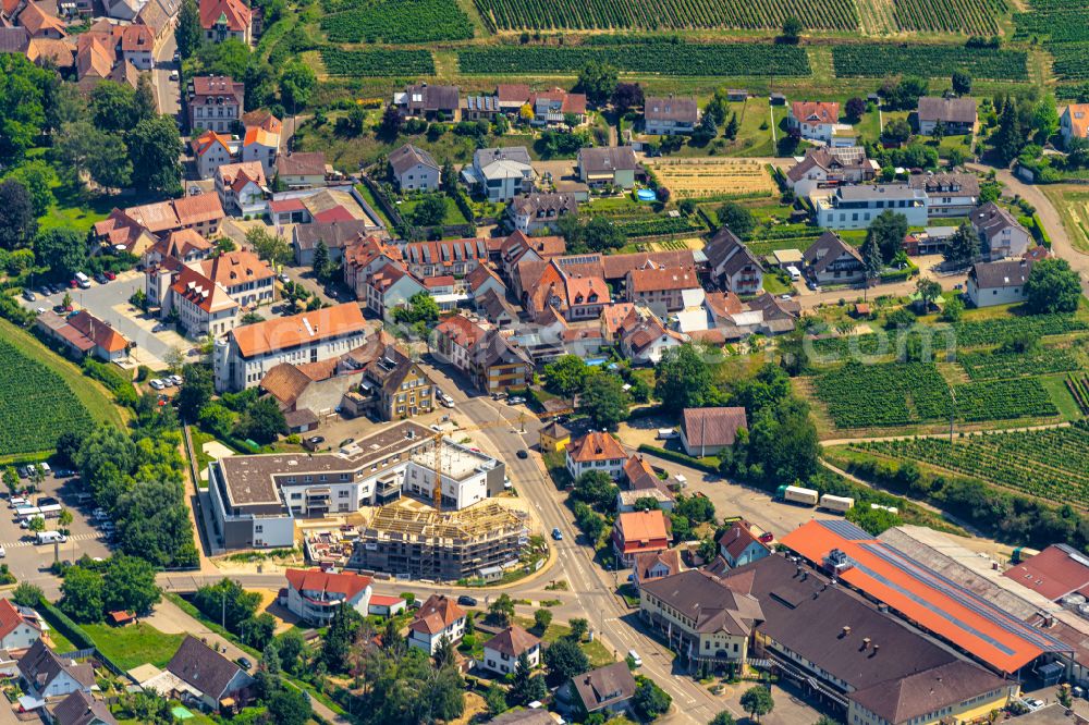 Aerial photograph Oberrotweil - Construction site for the multi-family residential building on street Bahnhofstrasse in Oberrotweil in the state Baden-Wuerttemberg, Germany