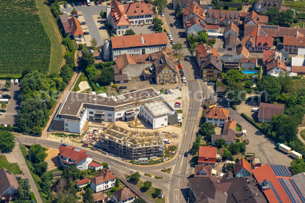Oberrotweil from above - Construction site for the multi-family residential building on street Bahnhofstrasse in Oberrotweil in the state Baden-Wuerttemberg, Germany