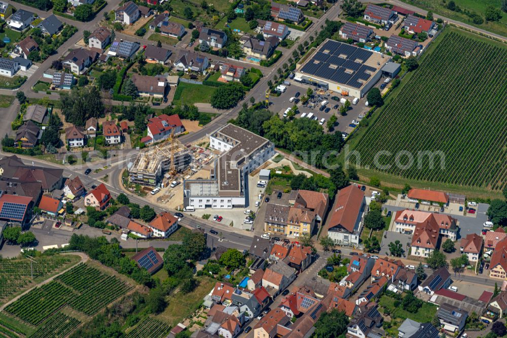 Aerial image Oberrotweil - Construction site for the multi-family residential building on street Bahnhofstrasse in Oberrotweil in the state Baden-Wuerttemberg, Germany