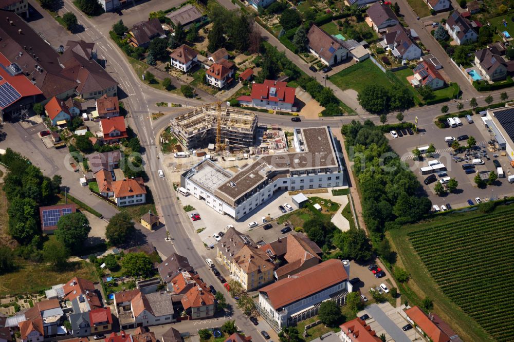 Aerial photograph Oberrotweil - Construction site for the multi-family residential building on street Bahnhofstrasse in Oberrotweil in the state Baden-Wuerttemberg, Germany