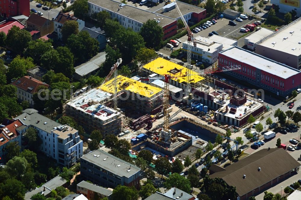 Aerial image Berlin - Construction site for the multi-family residential building on Areal Otto-Fronke-Strasse - Buechnerweg - Moissistrasse - Anna-Seghers-Strasse in the district Adlershof in Berlin, Germany