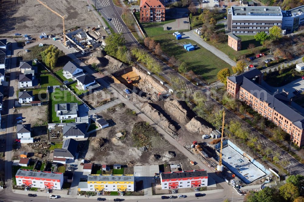 Magdeburg from the bird's eye view: Construction site for the multi-family residential building on Brueckstrasse - Vor der Turmschanze in the district Brueckfeld in Magdeburg in the state Saxony-Anhalt, Germany