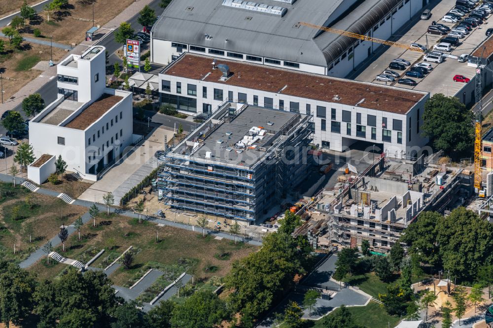 Würzburg from the bird's eye view: Construction site for the multi-family residential building on street Elisabeth-Scheuring-Strasse - Am Terassenpark in the district Frauenland in Wuerzburg in the state Bavaria, Germany