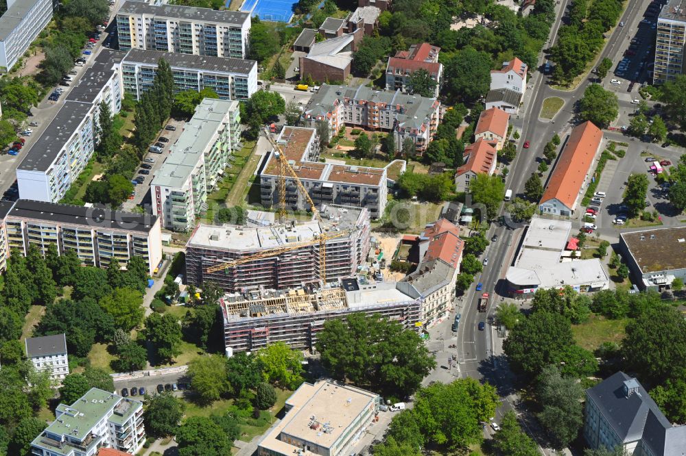 Berlin from the bird's eye view: Construction site for the multi-family residential building on Einbecker Strasse in the district Friedrichsfelde in Berlin, Germany