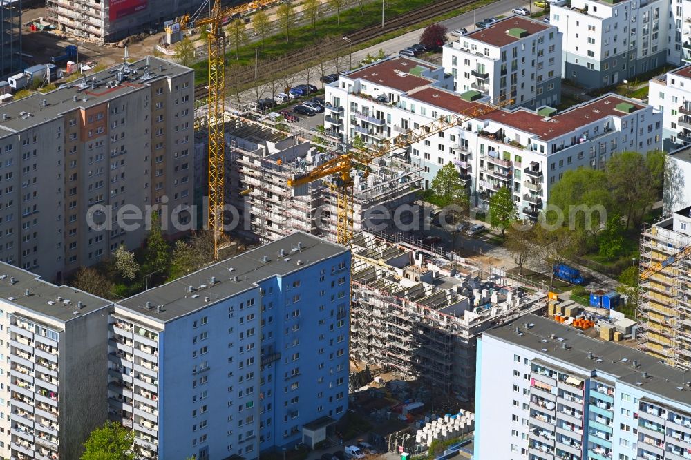 Berlin from above - Construction site for the multi-family residential building on Mittenwalder Strasse in the district Hellersdorf in Berlin, Germany