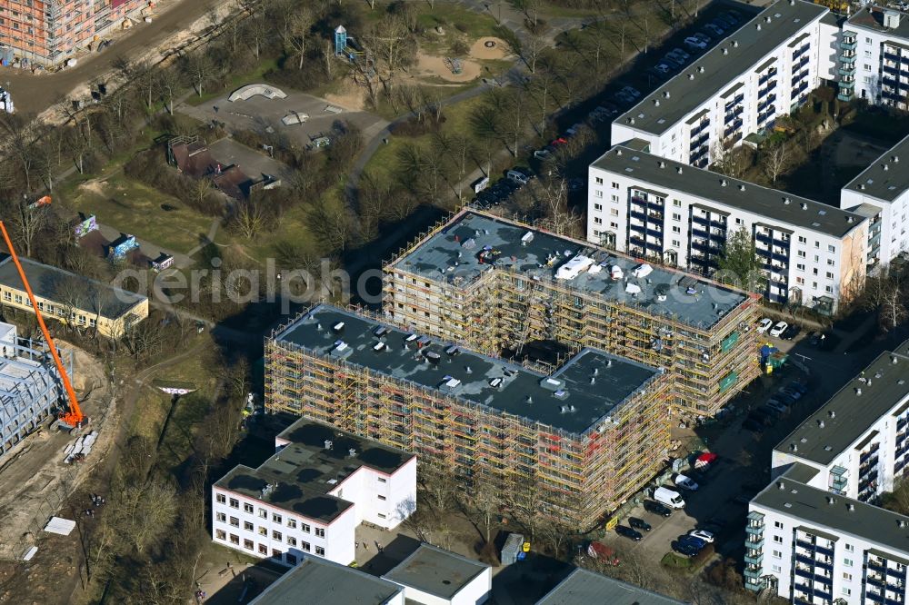 Berlin from the bird's eye view: Construction site for the multi-family residential building on Senftenberger Strasse in the district Hellersdorf in Berlin, Germany