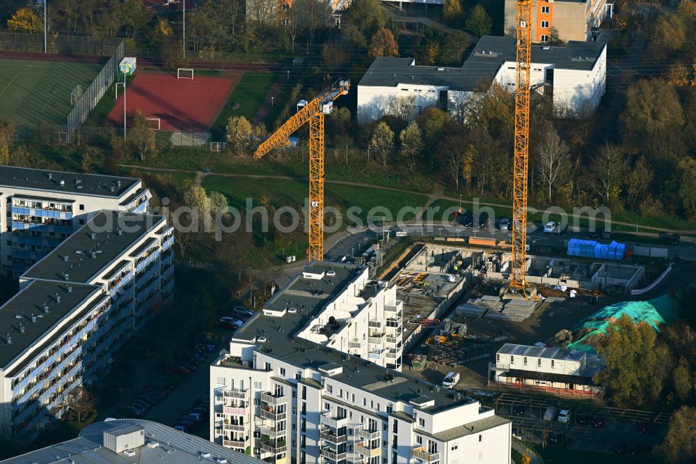 Berlin from above - Construction site for the new construction of an apartment building on Martin-Riesenburger-Strasse in the district of Hellersdorf in Berlin, Germany