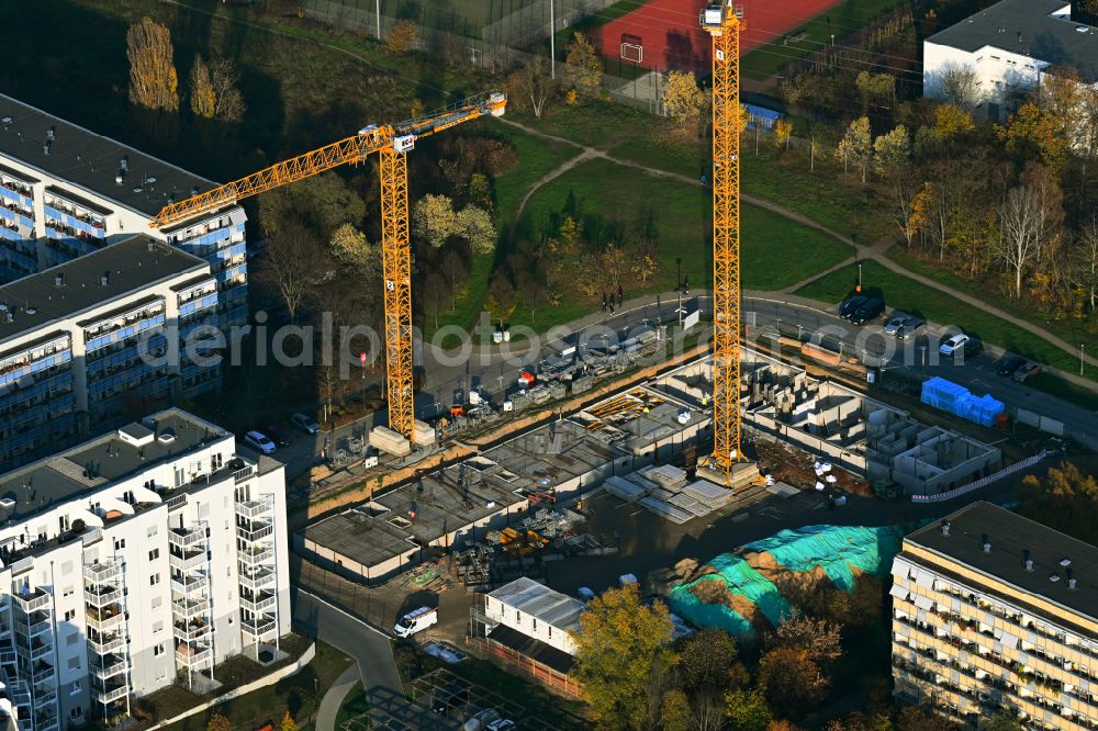 Aerial photograph Berlin - Construction site for the new construction of an apartment building on Martin-Riesenburger-Strasse in the district of Hellersdorf in Berlin, Germany