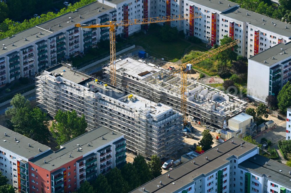 Berlin from the bird's eye view: Construction site for the multi-family residential building on street Bodo-Uhse-Strasse in the district Hellersdorf in Berlin, Germany