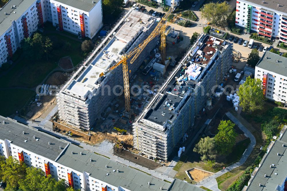 Berlin from above - Construction site for the multi-family residential building on street Bodo-Uhse-Strasse in the district Hellersdorf in Berlin, Germany