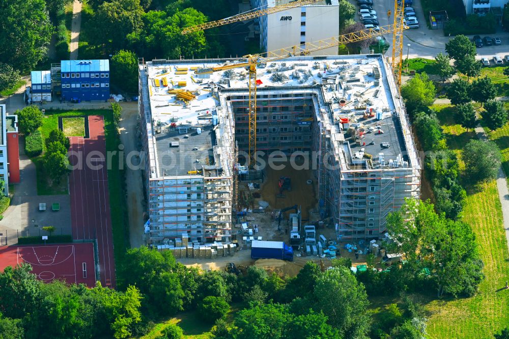Berlin from the bird's eye view: Construction site for the multi-family residential building on street Wittenberger Strasse in the district Marzahn in Berlin, Germany