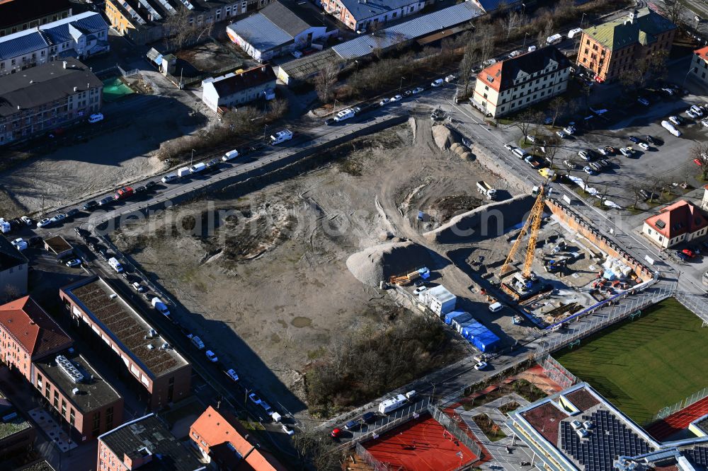 München from the bird's eye view: Construction site for the multi-family residential building on street Hessstrasse - Frei-Otto-Strasse in the district Neuhausen-Nymphenburg in Munich in the state Bavaria, Germany