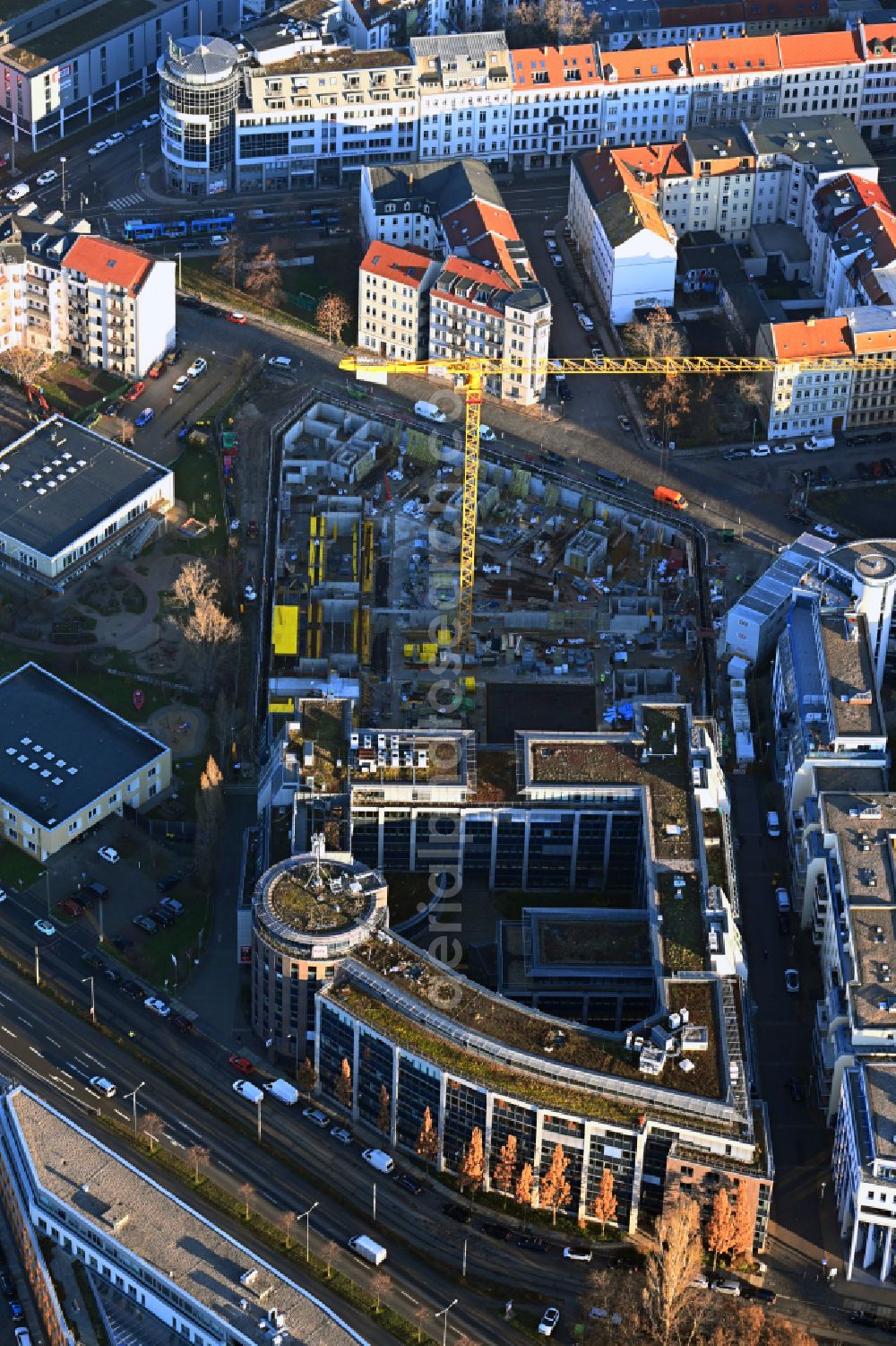 Leipzig from the bird's eye view: Construction site for the multi-family residential building on street Johann-Eck-Strasse - Lutherstrasse in the district Neustadt-Neuschoenefeld in Leipzig in the state Saxony, Germany