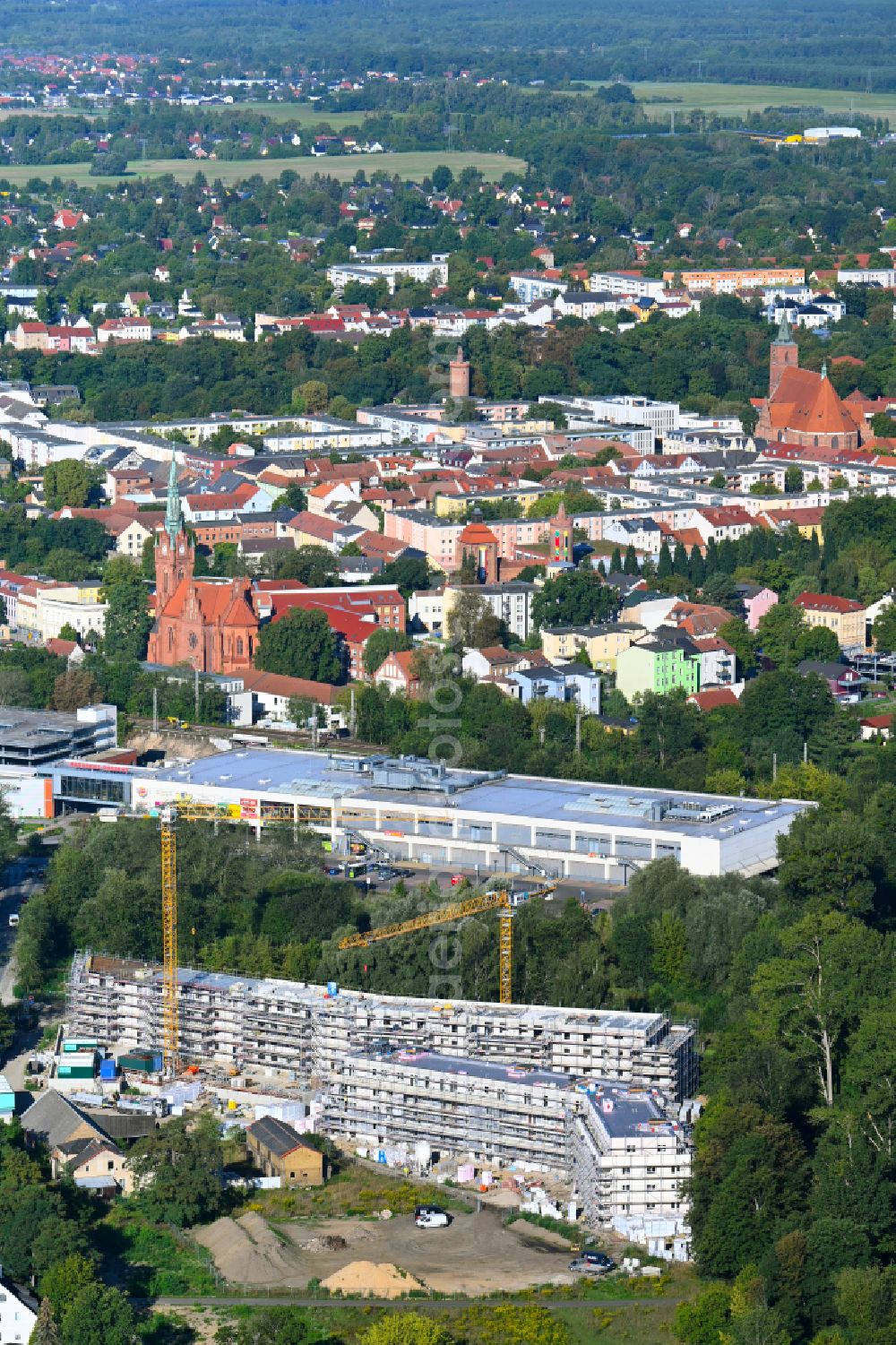Bernau from above - Construction site for the multi-family residential building of Projekts Panke Aue on Schoenfelder Weg in Bernau in the state Brandenburg, Germany
