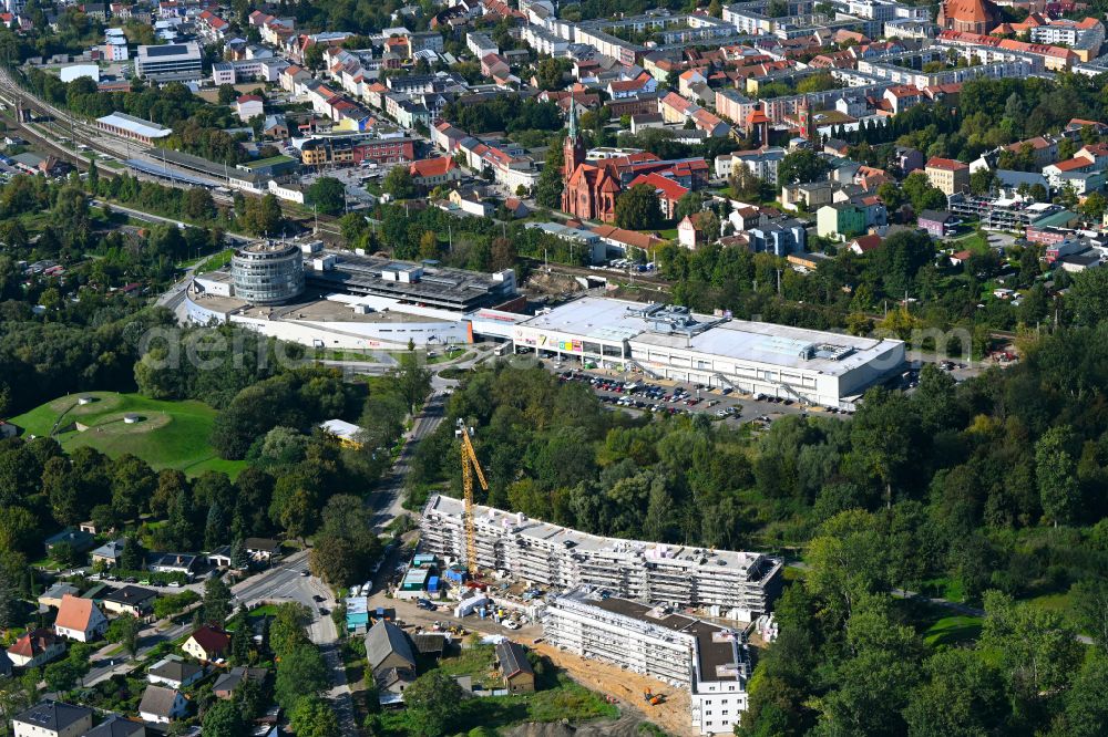 Bernau from the bird's eye view: Construction site for the multi-family residential building of Projekts Panke Aue on Schoenfelder Weg in Bernau in the state Brandenburg, Germany