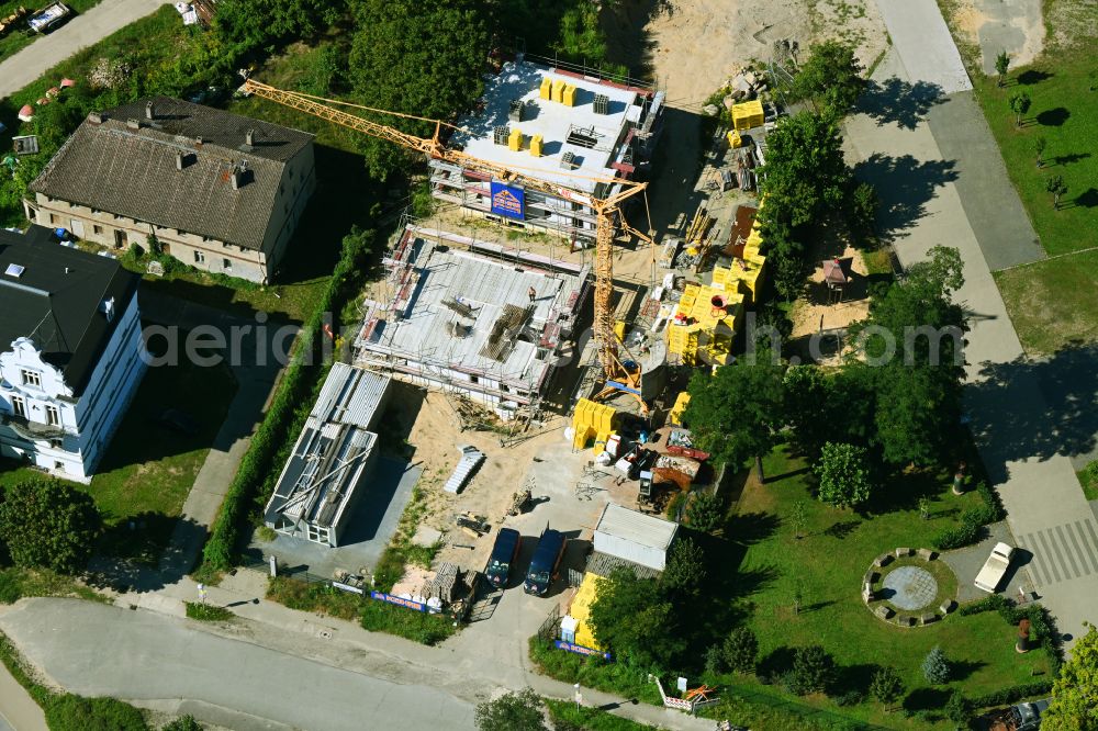 Aerial photograph Hoppegarten - Construction site for the multi-family residential building on Rennbahnallee in the district Dahlwitz in Hoppegarten in the state Brandenburg, Germany