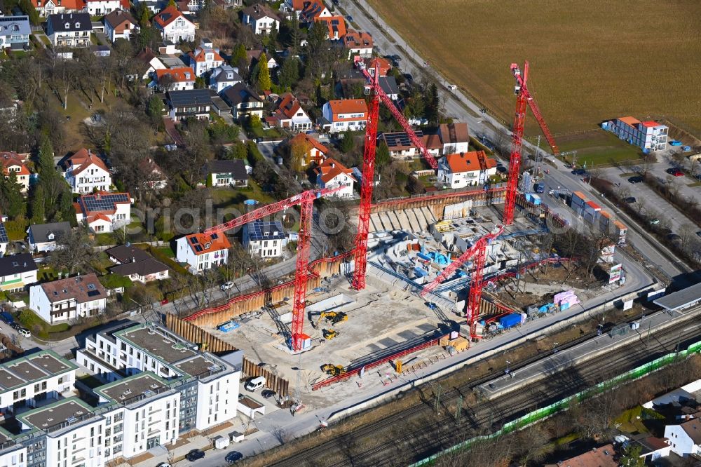 Haar from the bird's eye view: Construction site for the multi-family residential building Schneiderhof on Heimgartenstrasse in the district Gronsdorf in Haar in the state Bavaria, Germany