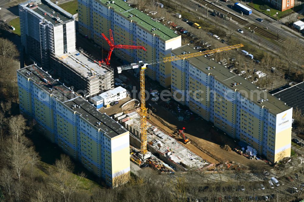 Berlin from the bird's eye view: Construction site for the multi-family residential building with Studentenapartments of Belinovo Grundstuecksentwicklung GmbH on street Rhinstrasse in the district Friedrichsfelde in Berlin, Germany