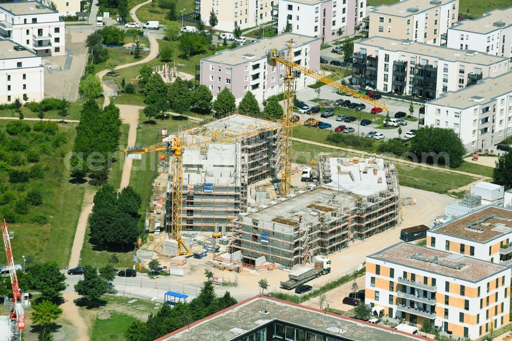 Aerial photograph Schönefeld - Construction site for the multi-family residential building Theodor-Fontane-Hoefe on Theodor-Fontane-Allee - Bayangolpark in Schoenefeld in the state Brandenburg, Germany